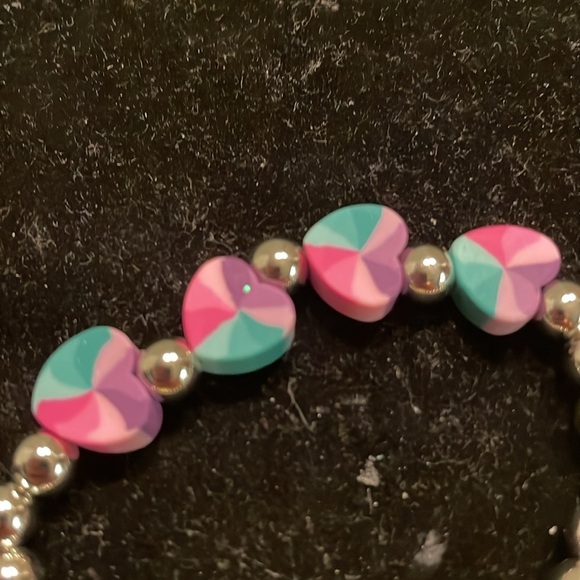 7” beaded stackable stretch bracelet with 23 silver beads & 4 heart shaped beads - Picture 10 of 13